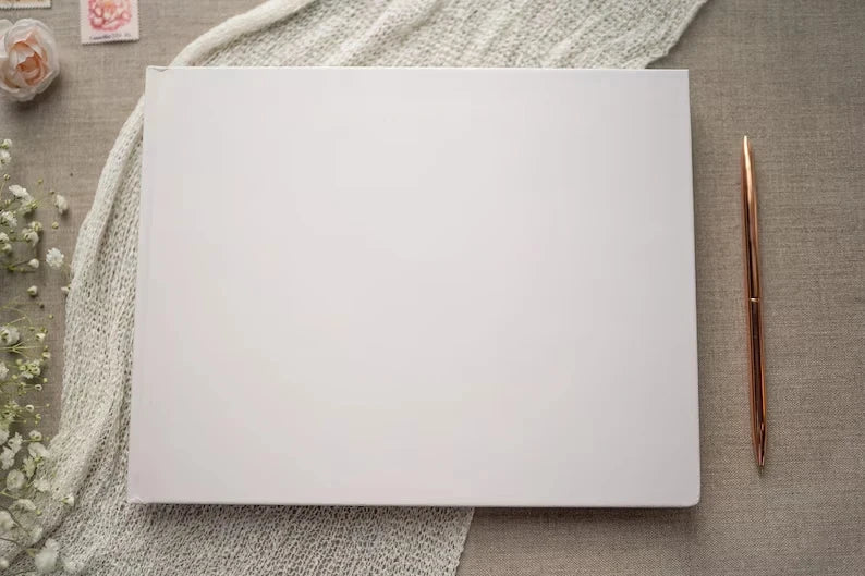 The Diamond Guestbook - Our signature guestbook designed to capture the love, laughter and messages from your special day.