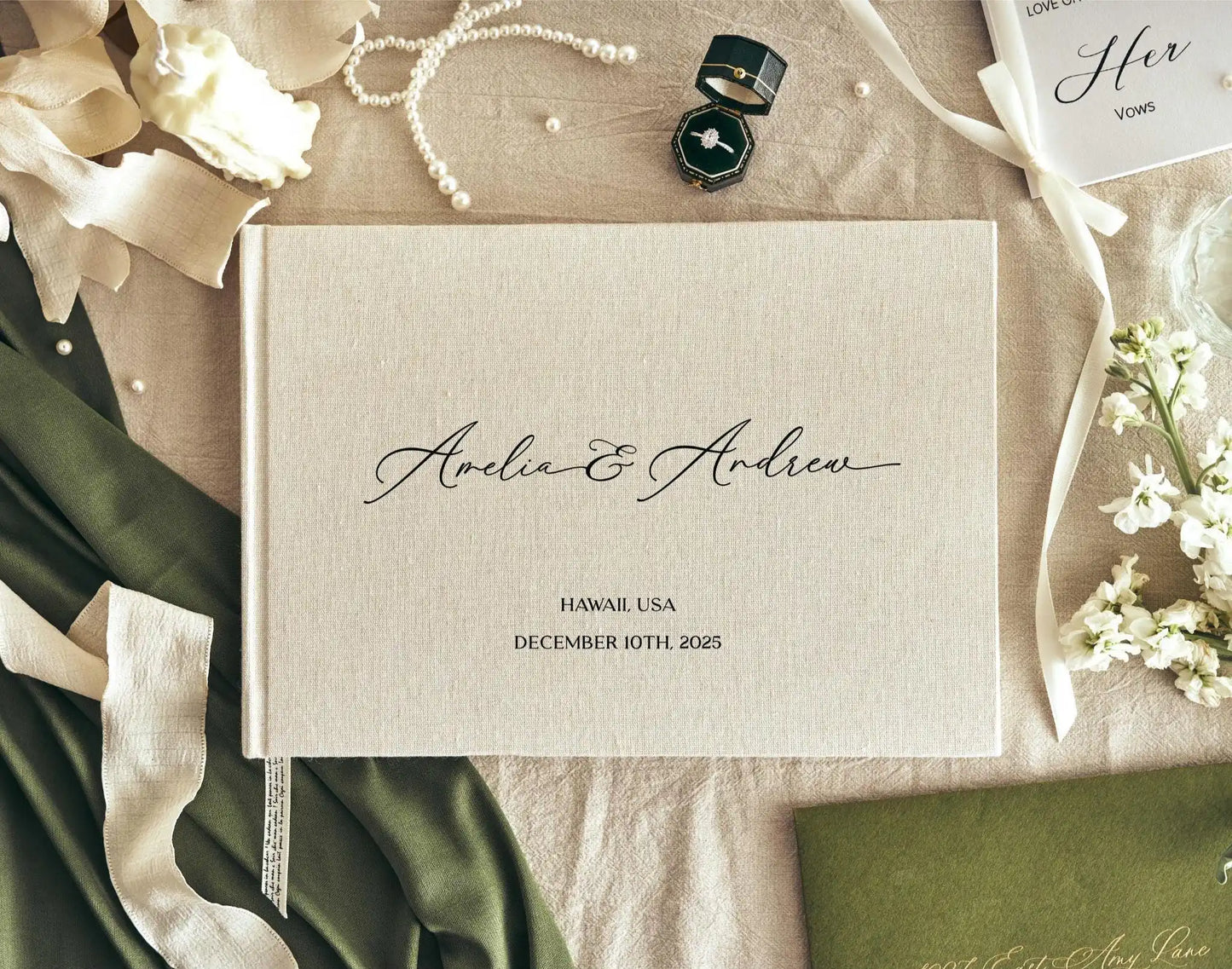 The Emerald Embossed Linen Guestbook - A beautifully crafted linen guestbook with embossed detailing for couples who want something truly special.