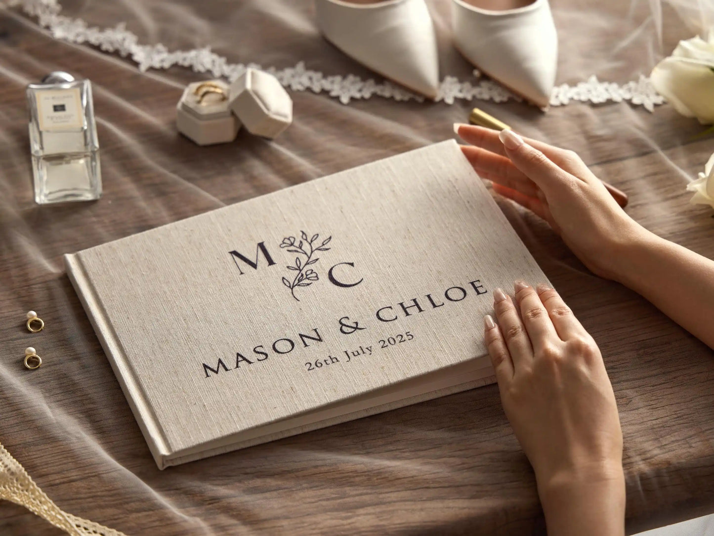 The Emerald Embossed Linen Guestbook - A beautifully crafted linen guestbook with embossed detailing for couples who want something truly special.
